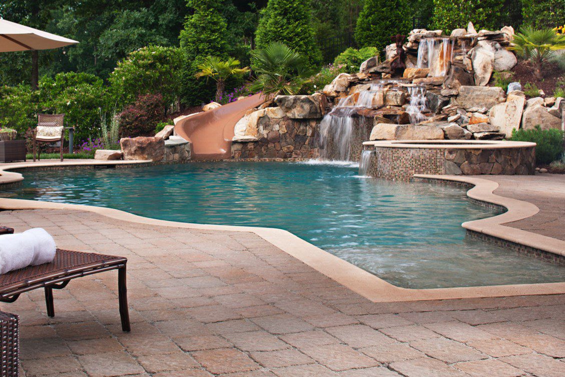 Pool Decks, Interlocking Pavers, Concrete Pavers, Riverside Pavers, Turf